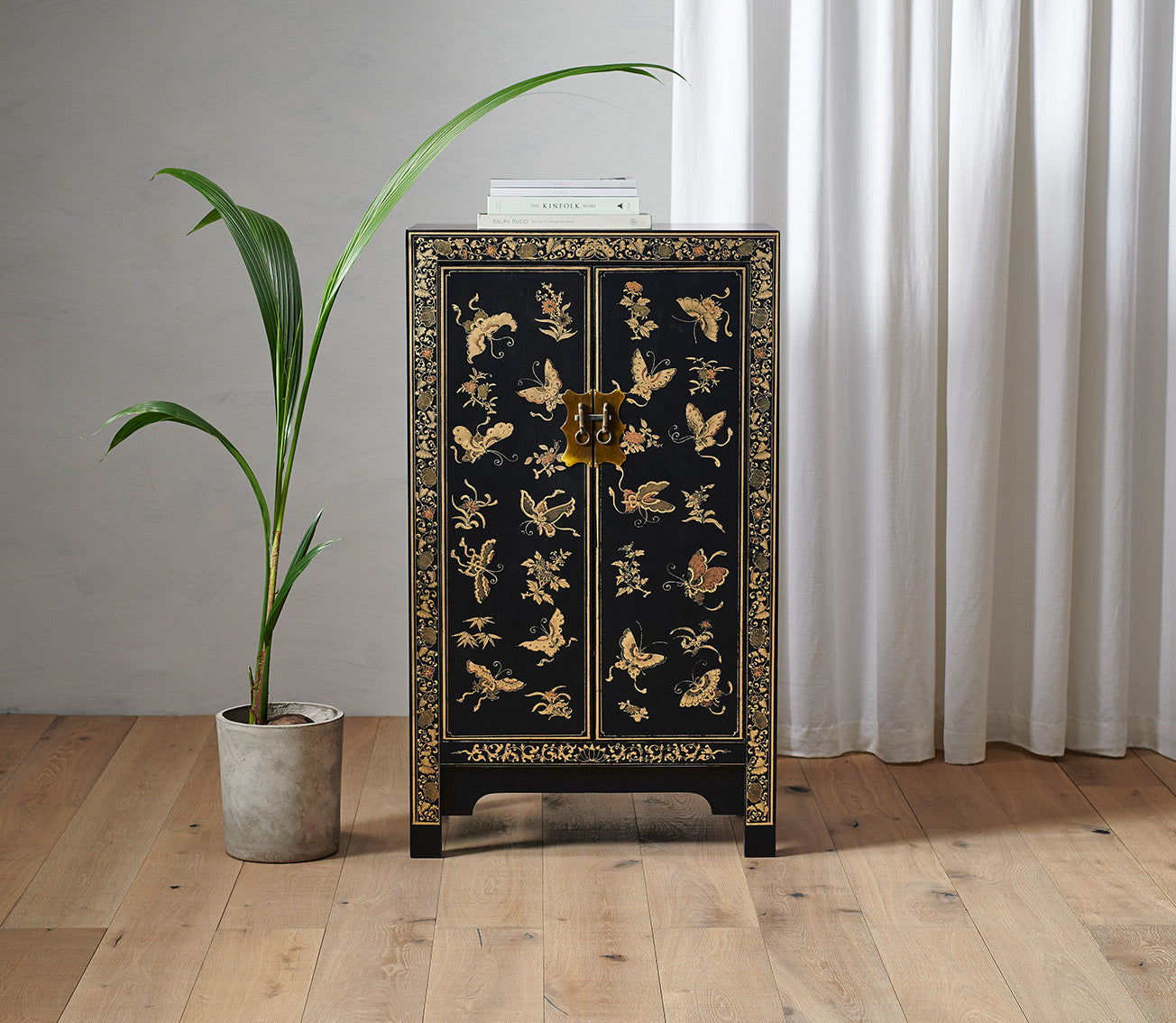 Oriental decorated black medium cabinet